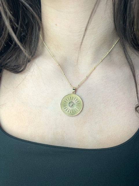 Large sunburst necklace on gold-plated 16" dot chain